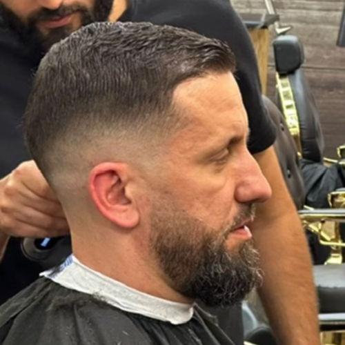 Mid Fade mit vollem Bart